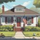 Home in Pasadena MD during the summer with an American flag